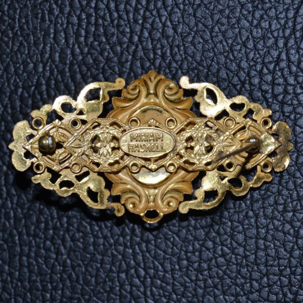 Spilla MIRIAM ASKELL tono oro e cabochon iridato - immagine 2